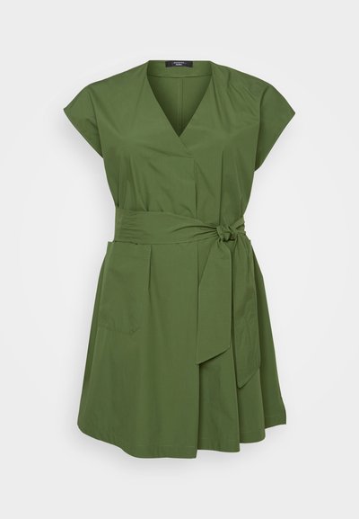 Green wrap dress with short sleeves, v-neckline, front tie belt, side pockets, and a lightweight textured fabric.