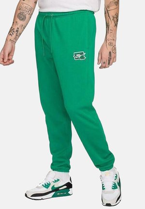 Nike Sportswear Pantalones deportivos - green