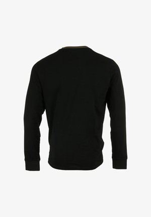 Camiseta negra de manga larga con cuello redondo, detalles acanalados y silueta ajustada. El material tiene una textura suave.