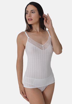 White camisole with lace detailing at the neckline, featuring vertical stripes, thin straps, and a semi-sheer textured fabric.