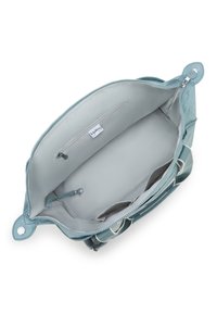 A turquoise leather bag with a zip closure; features a smooth interior with a zip pocket and metal accents. Spacious with large compartments.