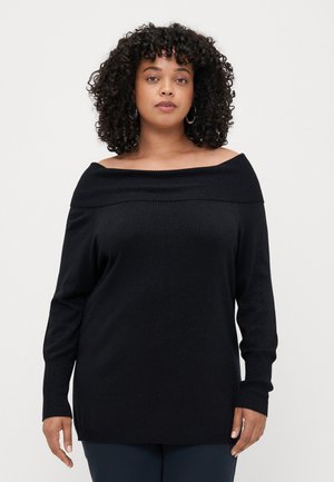 Black off-the-shoulder sweater with ribbed neckline and long sleeves, made of textured fabric, showing a relaxed fit and simple design.
