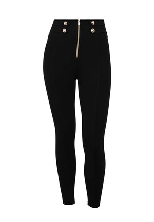 Pantalones ajustados de talle alto en negro con cremallera dorada frontal y dos pares de detalles de botones dorados en la cintura.