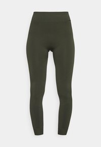 Legginsy w kolorze oliwkowym, bezszwowe i o wysokim stanie, z teksturowanymi panelami na łydkach i w pasie, przeznaczone do aktywności fizycznej i komfortu.