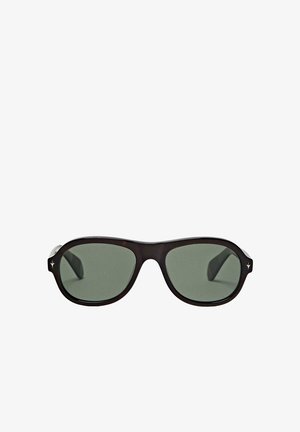 Black oval sunglasses with dark green lenses and small silver star-shaped details on the frame edges.