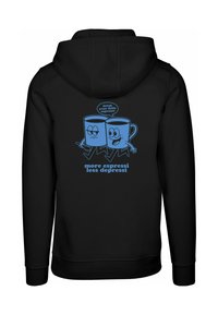 Felpa nera con cappuccio che presenta una grafica di due tazze di caffè in stile cartone animato blu. Il testo recita "più espressi meno depressi" con un fumetto.
