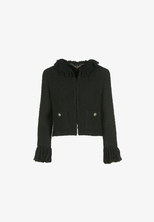 Black cropped jacket made of textured fabric, featuring a fringed collar and cuffs, two front pockets, and metallic button accents.