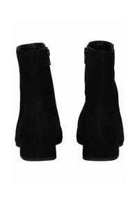 Bottines en velours noir avec un petit talon bloc et une fermeture éclair sur le côté. Présentent une texture lisse et un design simple, adaptées à différentes tenues.