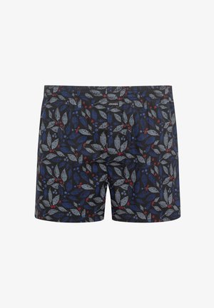 Boxershorts med en svart bakgrund och ett lövmönster i blå, grå och röda nyanser, tillverkade av mjukt tyg med en elastisk midja.