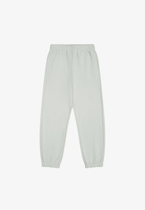 Helle grüne Jogginghosen mit elastischem Bund, schmal zulaufenden Knöcheln und Seitentaschen. Hergestellt aus einem glatten, dehnbaren Stoff.