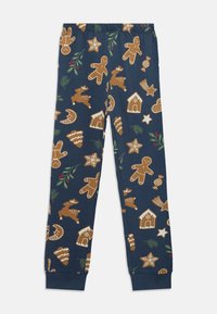 Ναυτικά παντελόνια πιτζάμας με σχέδιο από άνδρες μπισκότο, ταράνδρους, γλυκά και χριστουγεννιάτικες διακοσμήσεις; κατασκευασμένα από μαλακό ύφασμα με ελαστική μέση.