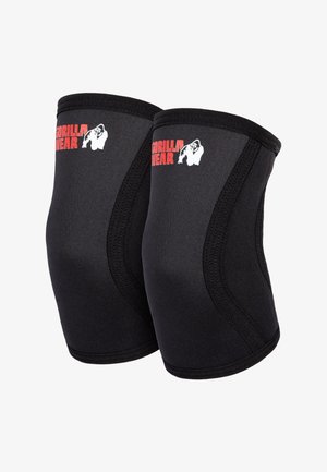 Een paar zwarte kniebeschermers met een rood "Gorilla Wear"-logo en een wit gorilla-icoon, ontworpen voor gewrichtsondersteuning tijdens trainingen.