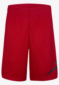 Bermudas deportivas rojas hechas de tejido de malla transpirable, con un acento de diseño negro en la pierna izquierda y una cintura elástica.