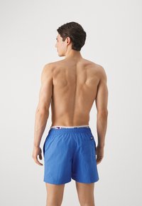 Tommy Hilfiger LOGOLINE MEDIUM DRAWSTRING - Uimashortsit - blue spell