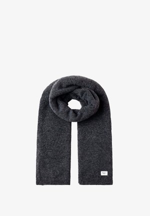 Dark gray knitted wool scarf folded in a loop with a small white rectangular brand label on one end.