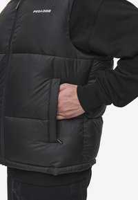 Pegador Väst - black