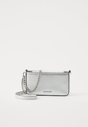 Silver textured leather crossbody bag with chain and strap, rectangular shape, and small brand logo on front.