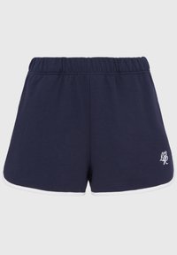 Námořnické modré bavlněné šortky s elastickým pasem, bílým lemováním na spodním okraji a malým vyšitým logem na levé přední straně.