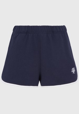 Marineblå bomullsshorts med elastisk midjebånd, hvit kanting nederst og en liten brodert logo på venstre front.