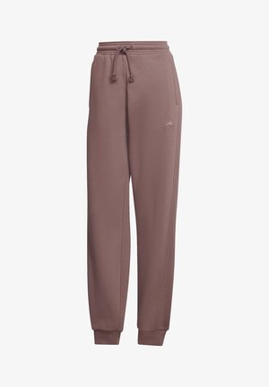 Spodnie dresowe wiśniowe z sznurkiem, elastycznymi mankietami, kieszeniami po bokach i małym logo Adidas na prawym udzie.