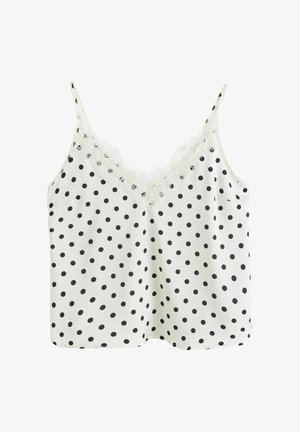 Biela košieľka s čiernymi bodkami, tenkými ramienkami a čipkovým lemom pozdĺž výstrihu do V.