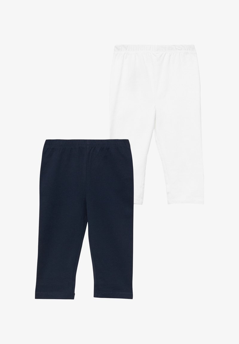 Deux paires de leggings pour tout-petits, une noire et une blanche, toutes deux avec une taille élastique et des jambes raccourcies.