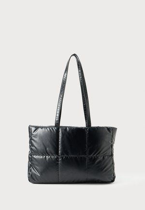 Black tote bag made of quilted, padded material featuring two adjustable handles and a smooth, shiny finish. Rectangular shape with stitched sections.