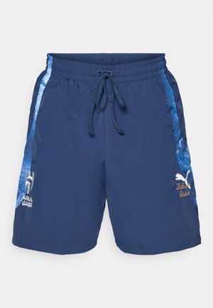 Navy blue uima shorts, joissa on joustava vyötärö, nyöri suljenta ja sivupaneelin korostukset sinisissä sävyissä. Sisältää logon kirjonnan.