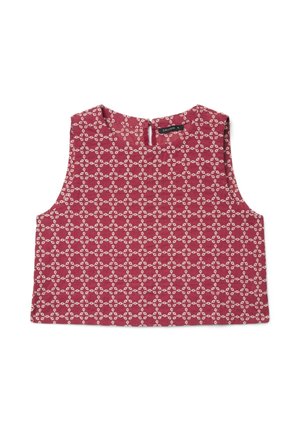 Haut court sans manches de couleur rose poudré avec un motif de cercles blancs entrelacés et une fermeture à bouton avec une ouverture en forme de goutte d'eau au niveau de la nuque.