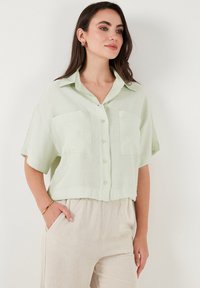 Unselected, mint