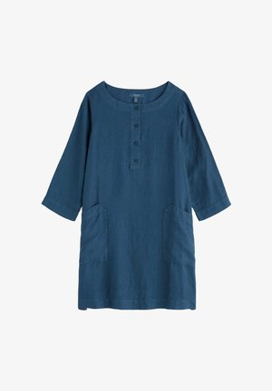 Vestido túnica de manga larga azul marino con escote redondo, cuatro botones en la tapeta frontal y dos grandes bolsillos delanteros.