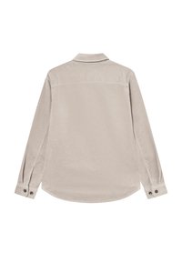 Beige kordflortskjorta med långa ärmar, knappmanschetter, krage och rundad nederkant. Har vertikal ribbstruktur.