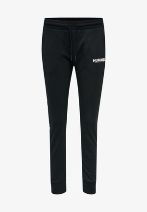 Zwarte sweatpants met een trekkoord in de taille, taps toelopende benen en een wit "HUMMEL" logo aan de voorkant. Gladde stof met ribbels aan de mouwen.