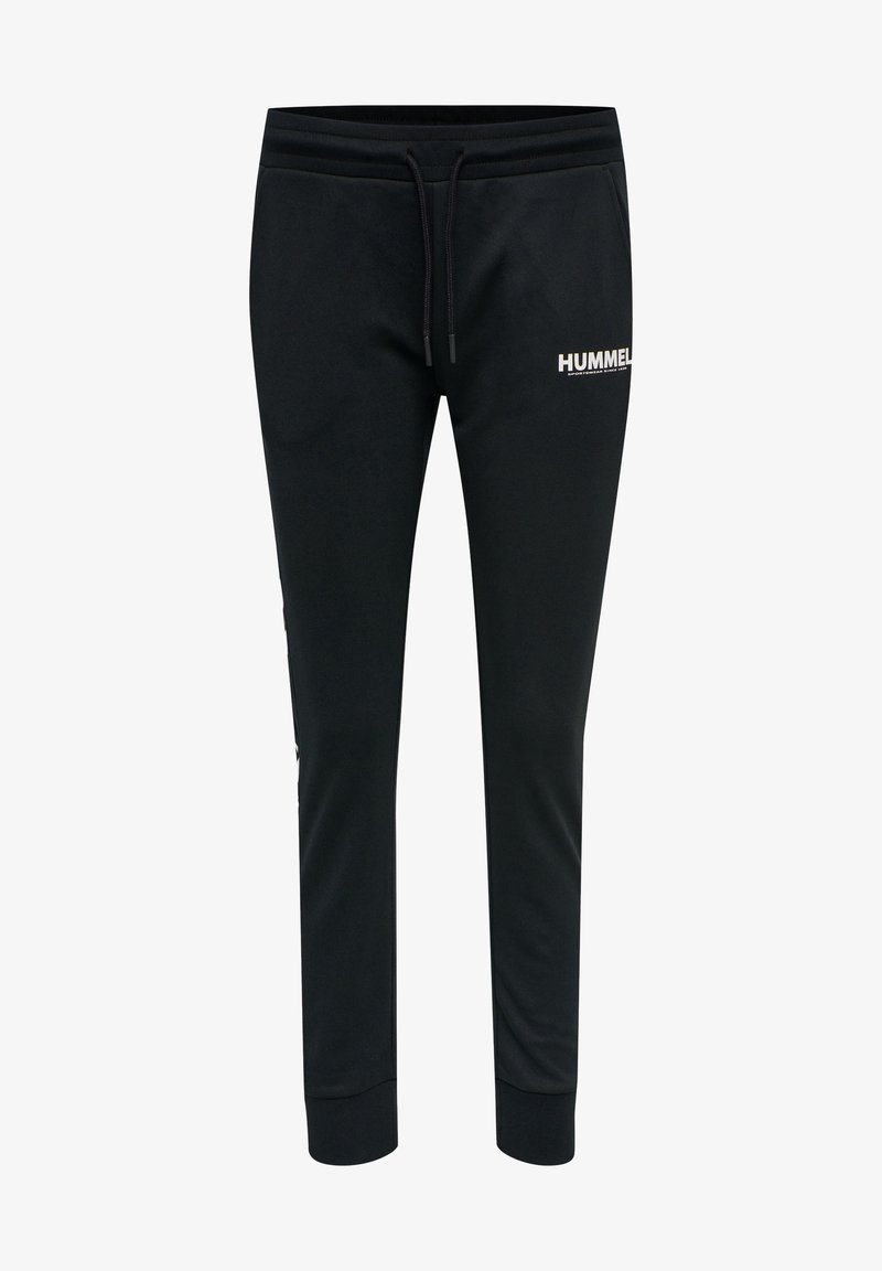 Svarta sweatpants med dragsko i midjan, avsmalnande ben och en vit "HUMMEL"-logotyp på framsidan. Slät tyg med ribbad mudd.