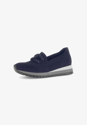 Navy suede shoe with a rounded toe, textured bow accent, and a white and gray layered sole with a serrated tread pattern.