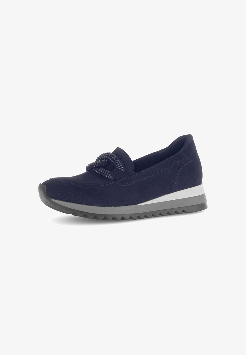 Navy suede shoe with a rounded toe, textured bow accent, and a white and gray layered sole with a serrated tread pattern.