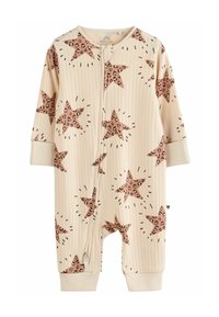 Combinaison côtelée beige avec des étoiles rose léopard, manches longues, fermeture éclair sur le devant et chevilles à revers. Présente une petite étiquette en forme de cœur.