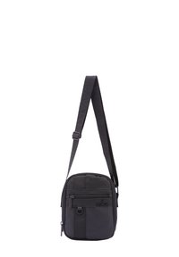 Borsa a tracolla nera con un tessuto liscio e resistente. Presenta una tasca anteriore con cerniera, un dettaglio logo e una tracolla regolabile. Forma rettangolare.