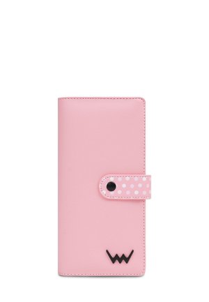 Pink synthetic leather wallet with a polka dot flap closure and black logo detail at the bottom. Sleek design and smooth texture.