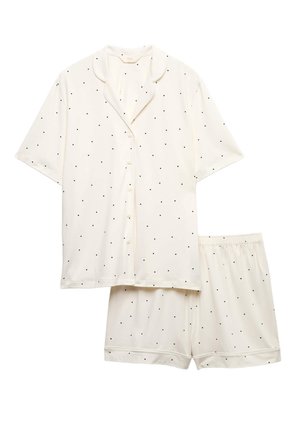 White short-sleeve button-up shirt and shorts pajama set with small black polka dots, elastic waistband on shorts.