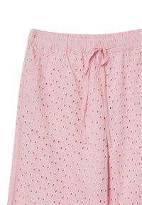 Shorts di cotone rosa chiaro con motivo a occhio di pernice, vita elasticizzata e lacci. Tessuto morbido, design casual e traspirante.