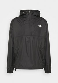 Zwarte kwart-rits windjack met capuchon, elastische manchetten, zakken aan de voorkant en klein wit The North Face-logo op de linkerkant van de borst.