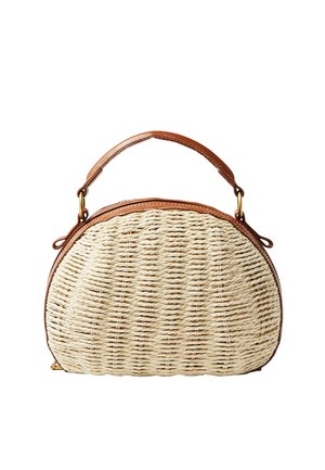 Ronde handgeweven strohandtas met handvat en afwerking van bruin leer, voorzien van goudkleurige metalen accenten en een ritssluiting.