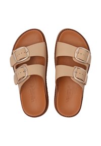 Beige lædersandaler med to justerbare spænder, brun sål, glat tekstur og en rund form. Har præget logo indeni.