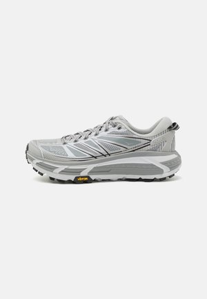 Gray running shoe with a textured mesh upper, reflective accents, a cushioned midsole, and a black rubber outsole featuring a yellow Vibram logo.