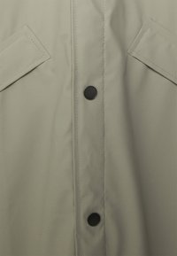 Rains LONGER JACKET UNISEX - Casaco impermeável - cement