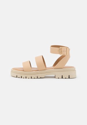 Korkeakorkoiset sandaalit - beige