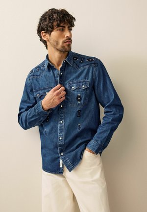 Next Pluus - blue