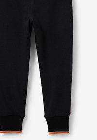 Marine jogger-broeken van zachte stof, met ribgebreide boorden en oranje en witte accenten aan de zoom. Taillering in een slim fit-design.