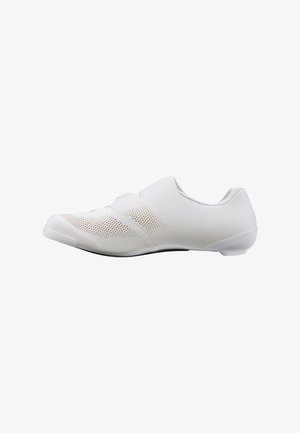 Scarpa da ciclismo bianca minimalista con fori di ventilazione perforati e suola a basso profilo, vista laterale su sfondo bianco uniforme.